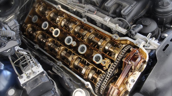 BMW e46 valve cover gasket taken off, viewing inside the valve cover